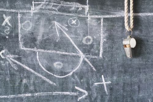 whistle of a soccer or football referee on black board with tact